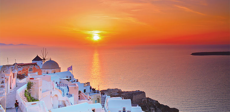 Cruceros por las Greek Islands, atardecer en Santorini. EworldCruises.com